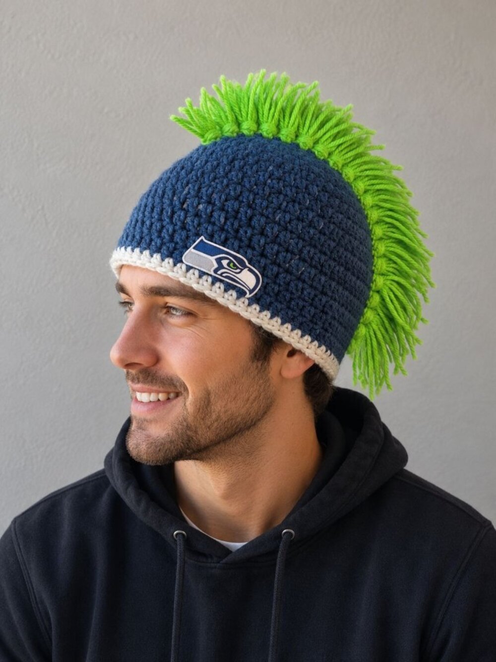 hand-crocheted Seattle Seahawks beanie blue yarn, a white brim, bright green Hat